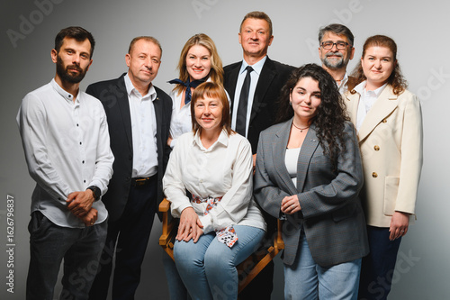 Billede på lærred Business team posing for a group photo in studio