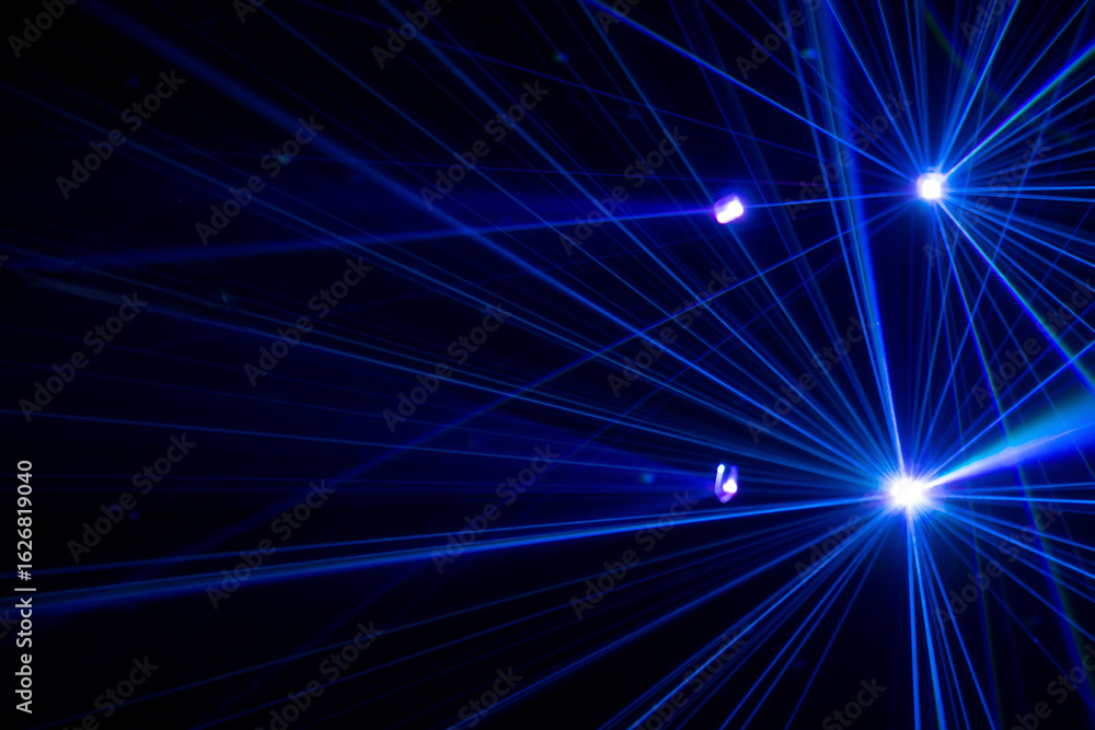 Obraz premium Blue beams in dark background.