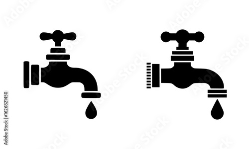Two black water taps dripping water