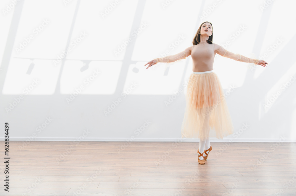 Ballerina dancing elegantly in light filled studio, graceful movement and artistic expression Ballerina dancing elegantly in light filled studio, graceful movement and artistic expression