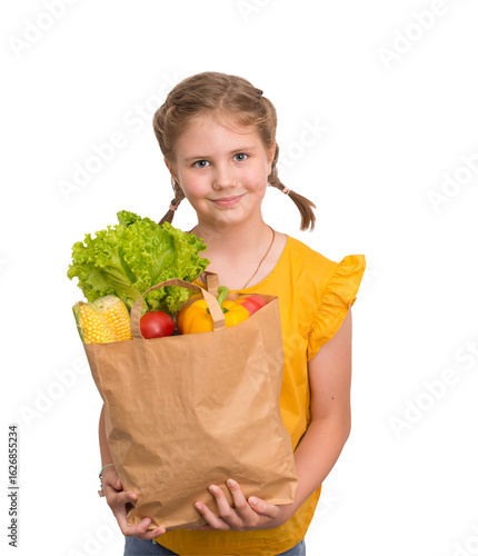 Smiling preteen girl holding paper bag filled with fresh vegetables and greens, isolated on transparent background. Perfect for healthy eating ads, grocery promotions, and family lifestyle designs.