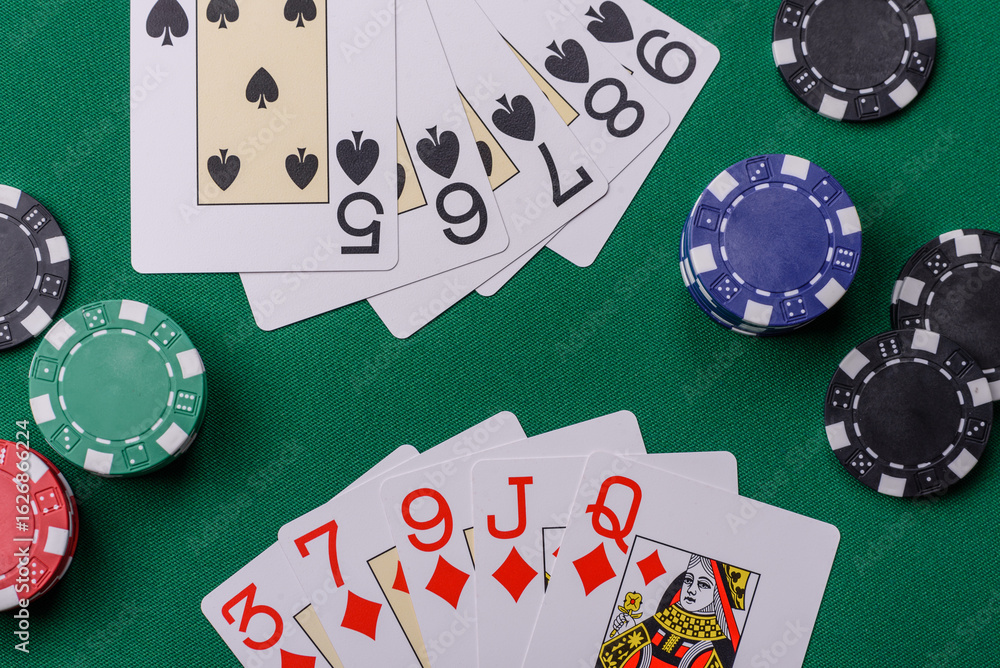 Fototapeta premium Playing card game poker in casino with chips, bets and risk. Cards and chips on elt