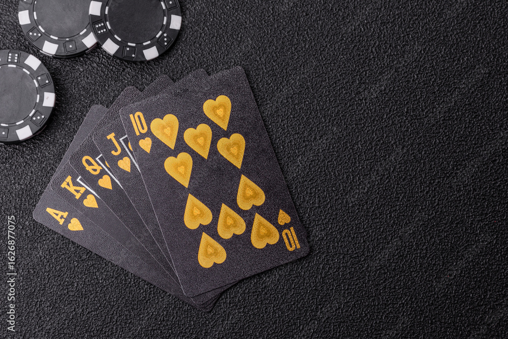 Obraz premium Playing card game poker in casino with chips, bets and risk. Cards and chips on elt