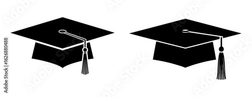 Vector art of two black graduation caps with tassels isolated on white background