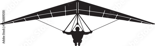 Silhouette of Paraglider and Pilot in Flight