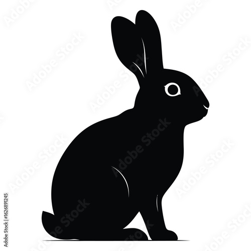 Black silhouette of a rabbit sitting with long ears and white eye bunny