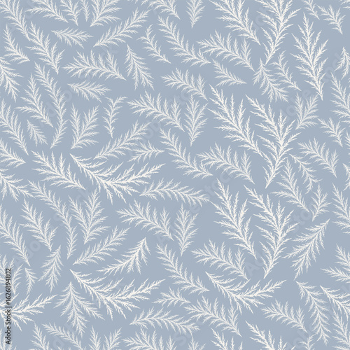 Delicate seamless pattern resembling icy frost branches on a soft blue background. Looks like frozen window frost. Elegant and subtle winter texture