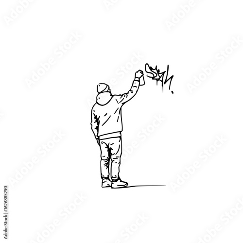 Silhouette of a person in a hoodie and beanie spraying graffiti on a white wall with a spray can tool