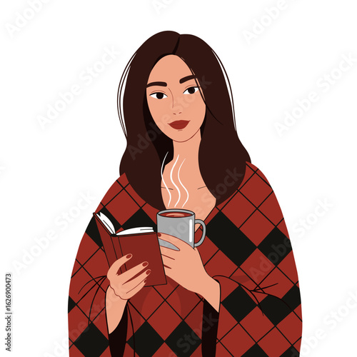 Young woman holding a book and cup of coffee in cozy blanket  