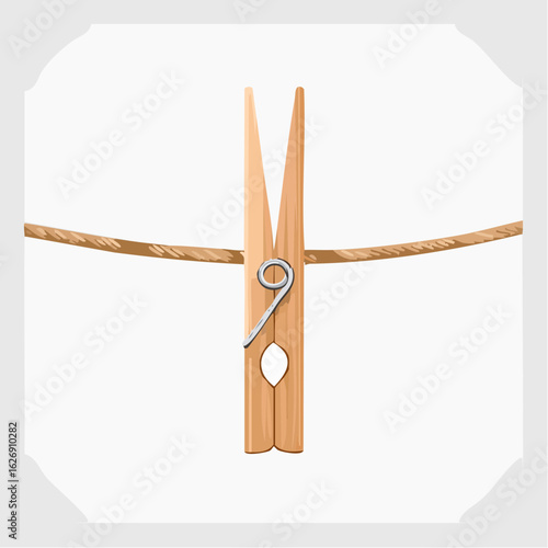 Wooden clothes peg on fabric line
