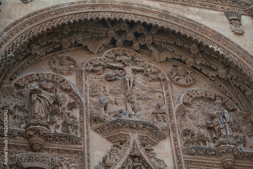 Картината върху платно Stone carved relief of the Crucifixion on the historic plateresque facade of the