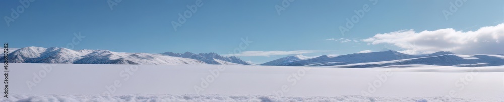 Fototapeta premium Crisp blue sky above pristine snow-covered landscape , cold weather, clear sky, serene
