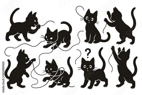 Playful black kittens interacting with string isolated on white background