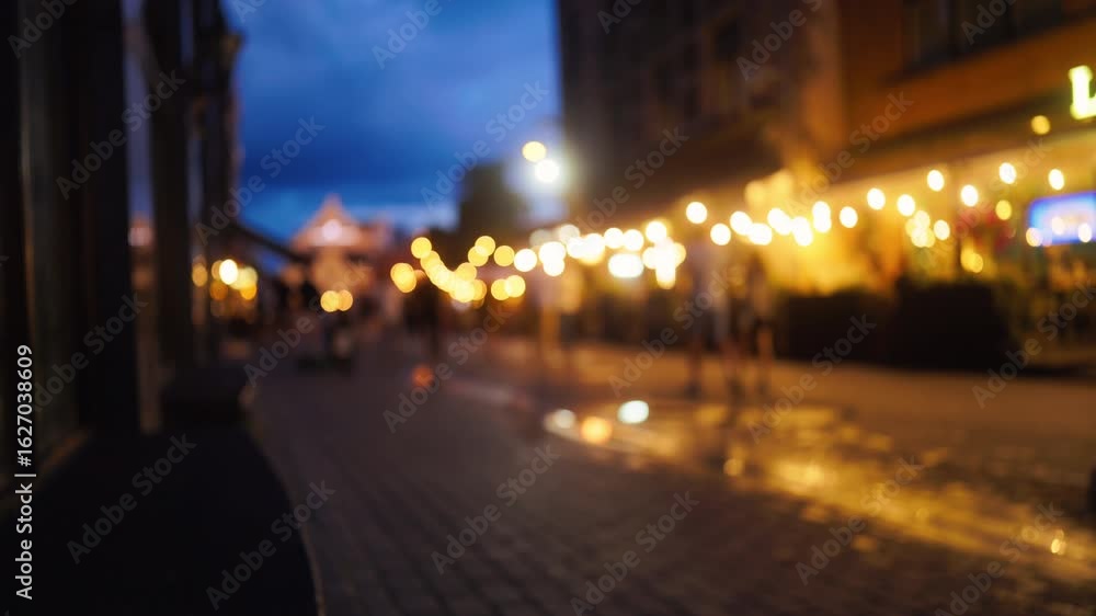 Charming and Enchanting Evening Scene Featuring Defocused Lights with People Strolling Happily Along Streets Charming and Enchanting Evening Scene Featuring Defocused Lights with People Strolling Happily Along Streets