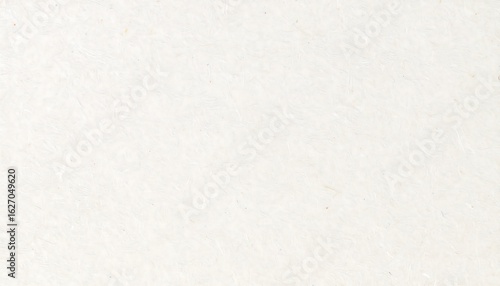 Close-up view of a plain white textured surface