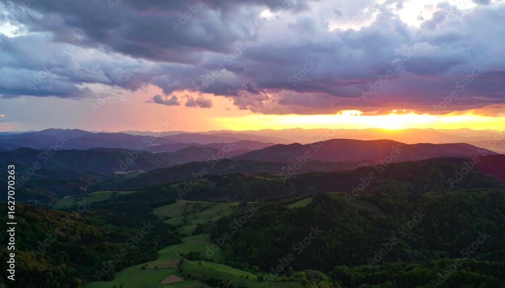 Fototapeta premium Panoramic sunset over rolling hills