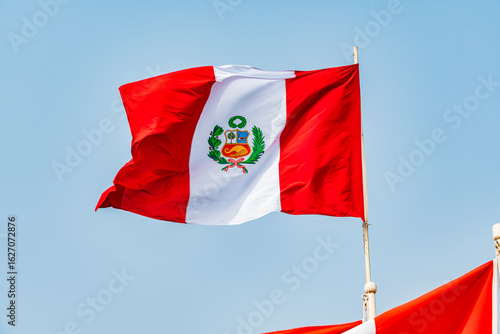 Fotografie Waving Peruvian flag - Lima, Peru