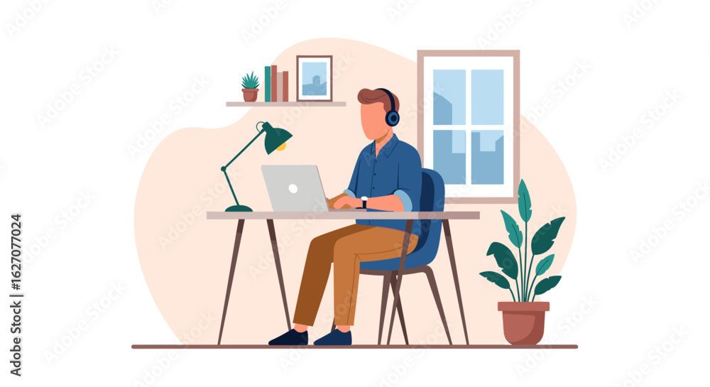Fototapeta premium Focused man with headphones working on laptop at modern home office desk. Illustrates remote work, online education, and digital lifestyle.