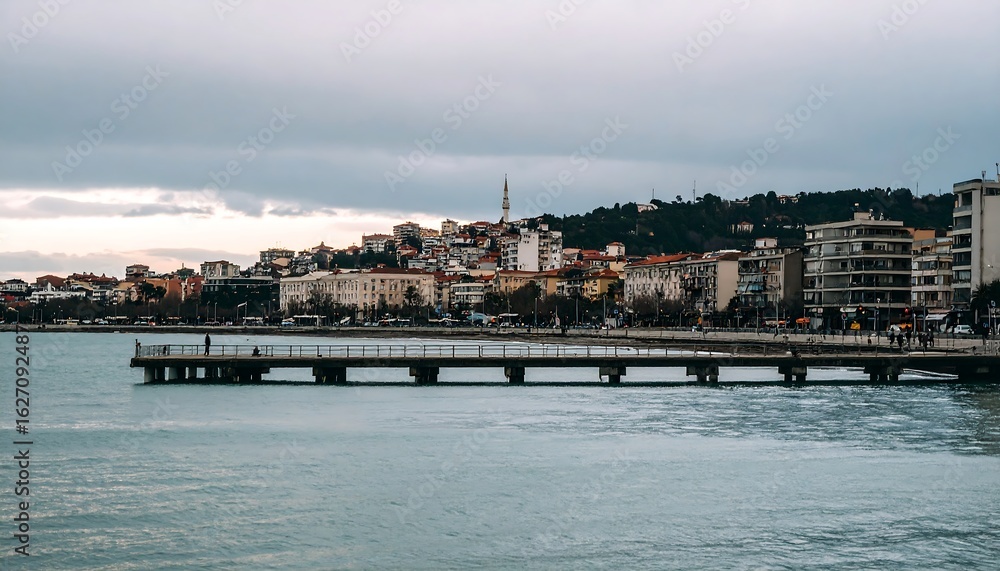Fototapeta premium Coastal city view on a cloudy day