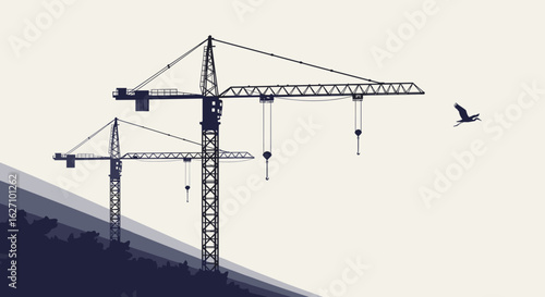 Construction cranes silhouetted against a pale background at dusk  