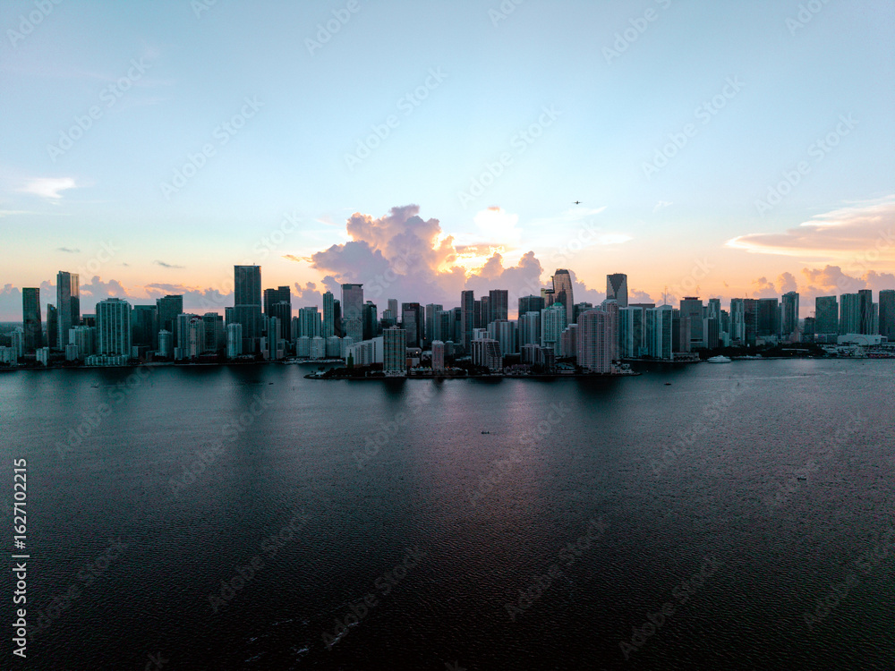 Fototapeta premium Drone view of downtown Miami skyline at sunset from over Biscayne Bay