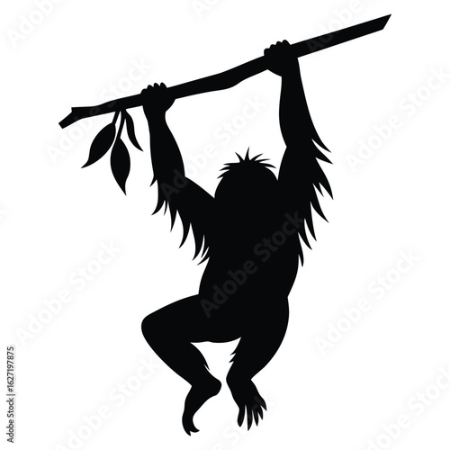Black silhouette of an orangutan hanging from a branch with leaves tree