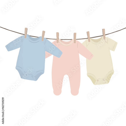 baby clothes hanging on clothesline