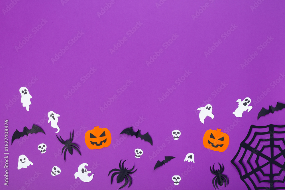 Fototapeta premium Paper crafts of pumpkins, skulls, ghosts, spiders and bats on purple background, halloween concept with copy space.