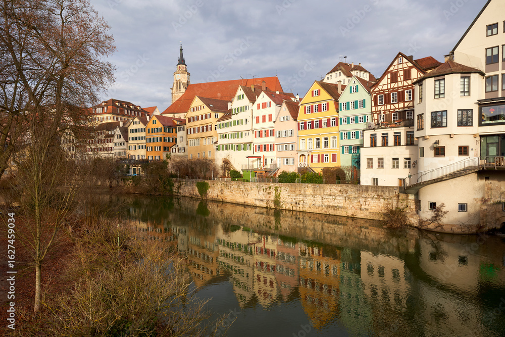 Naklejka premium Historic German old town on the riverbank. Reflections of half-timbered houses in the water. Europe, Germany, Tubingen, Neckar.