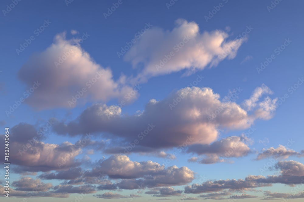 Obraz premium Pale clouds drift across a clear blue sky