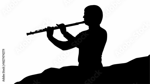 Silhouette of a person playing the flute while sitting on a dark surface against a white background