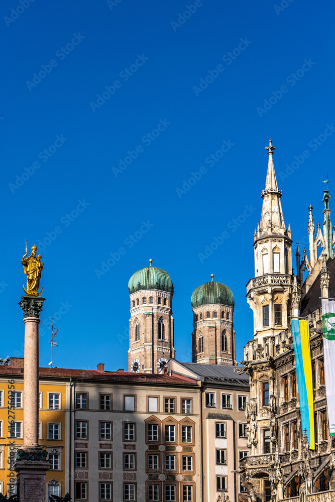Fototapeta premium View on Marienplatz town hall and Frauenkirche in Munich, Germany