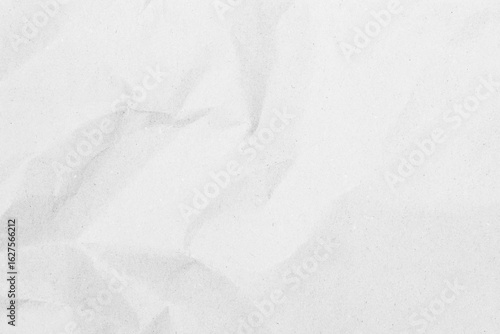 White recycled craft paper texture as background. Grey paper texture, Old vintage page or grunge vignette of old newspaper. Pattern rough art creased grunge letter. Hardboard with copy space for text.