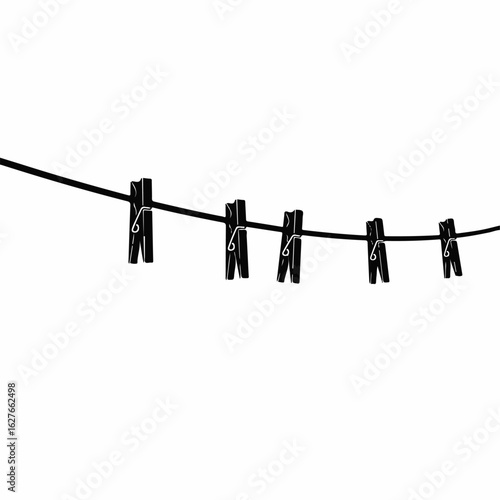 Washing line with five black clothespins hanging on a curved rope. Simple washing line image with classic clothespins attached.