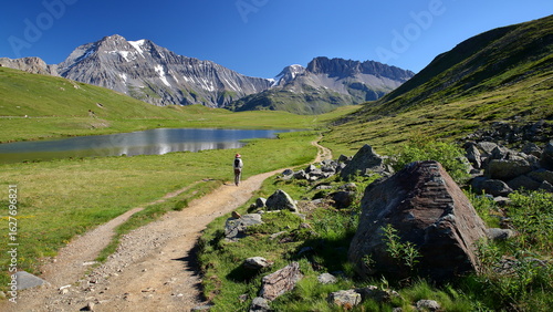 Plan du Lac, a high plateau located above Termignon in Vanoise National Park, Savoie, Northern French Alps, France, with a lake and three summits ( Grande Casse, Grande Motte and Pierre Brune)