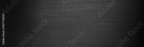 Dark shades gray and black textile with subtle woven texture and soft vignette edges. The horizontal panoramic format enhances depth, creating a sophisticated backdrop with rich tonal gradient.
