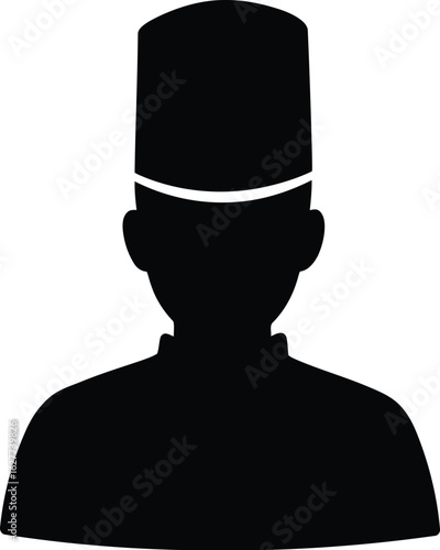 Silhouette man in kufi hat
