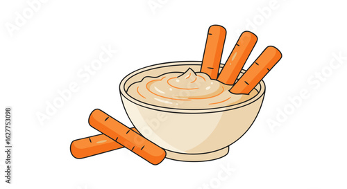 Hummus dip served with carrot sticks in a bowl  