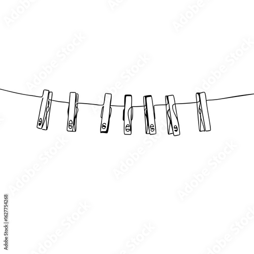 Line of clothespins hanging on wire in minimalist style  