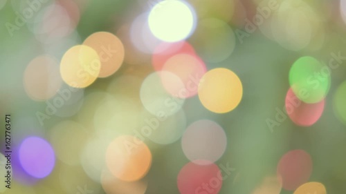 Multicolored Abstract blur lights Leaks 4k footage background, Bokeh effect with rays Christmas lamps garlands, for layout on your project, video styling, transitions