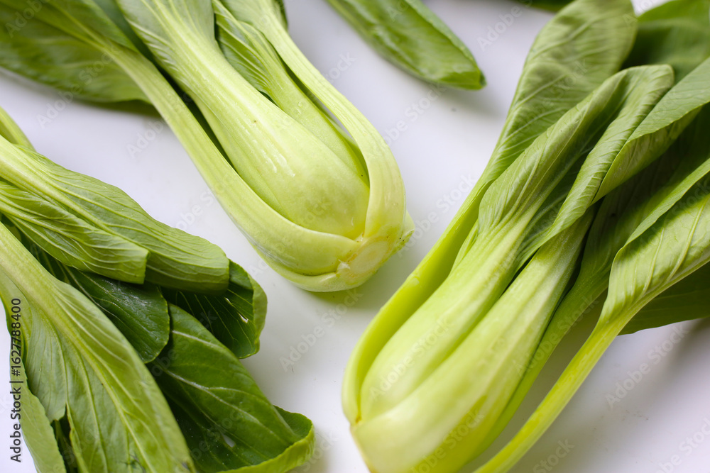 Fototapeta premium Fresh bok choy on white background.