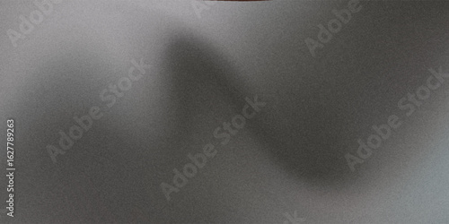 Blurry background with gradient of grey hues with noise effect
