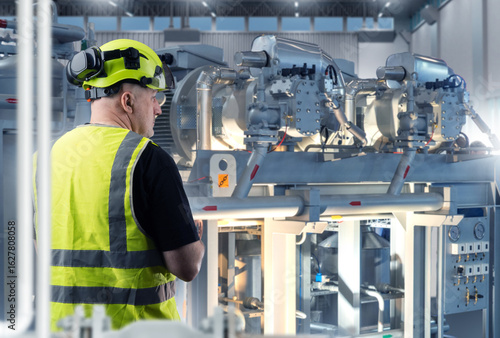 Industrial worker. Man near...