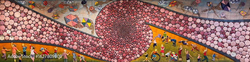Panoramic View of a Large Ceramic Mural with Children and Kites