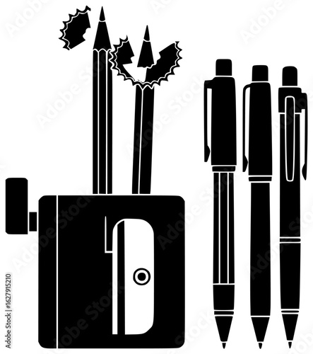 sharpener in school classroom with pencils and pens on desk