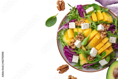 Vibrant salad with mango, feta, and walnuts
