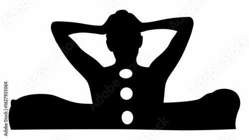 Silhouette of a person lying down with arms behind their head and stones on their back in black and white