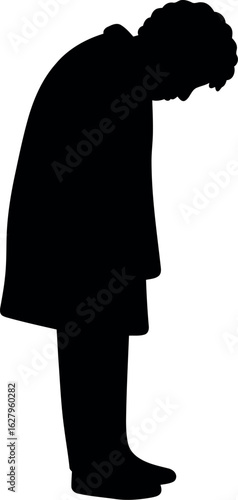 Silhouette of a person with head bowed conveying sadness or contemplation