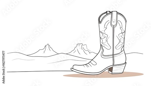 Cowboy boot on desert landscape