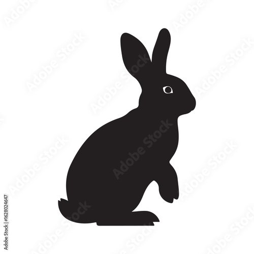 A black silhouette of a rabbit sitting upright with its ears perked